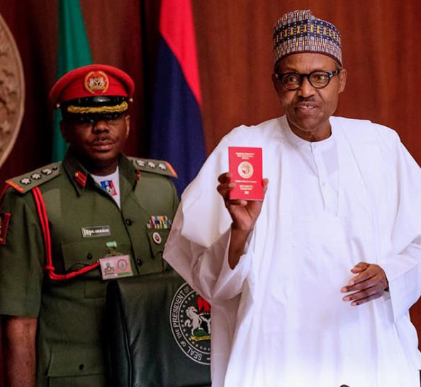 Photo of Buhari Launches a New Red Nigerian Passport with a 10 years Validity